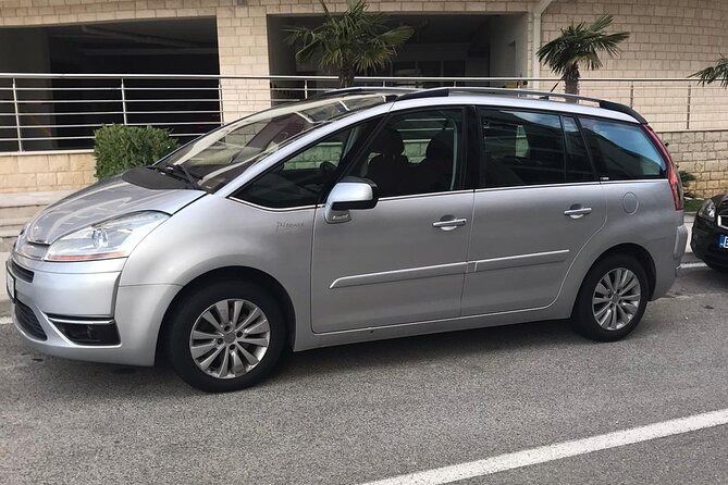Enjoy Private Transfers by Car or Van from Podgorica Airport to Budva or Becici - Late flights, rain, and the value of local driving