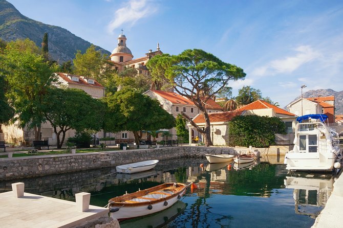 Kotor Bay Escape: Blue Cave, Beach & Swimming Time - Cruising past Perast and the villages of Kotor Bay