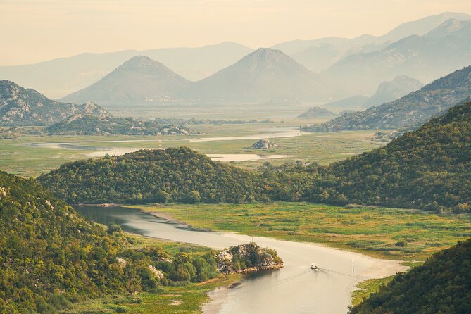 Skadar Lake & Crnojevića River: Swimming, Snacks & Wine - Wine, rakija, and priganice on the water