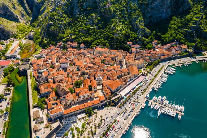The Grand Boka Tour:Blue Cave, Lady of the Rocks & Submarine Base - Cruising past the villages of Kotor Bay